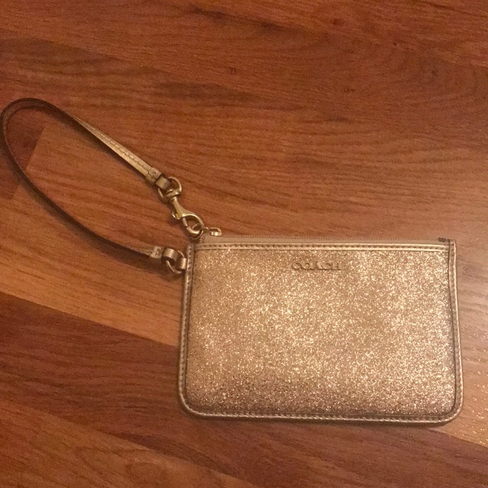 Gold Coach wristlet NEVER USED